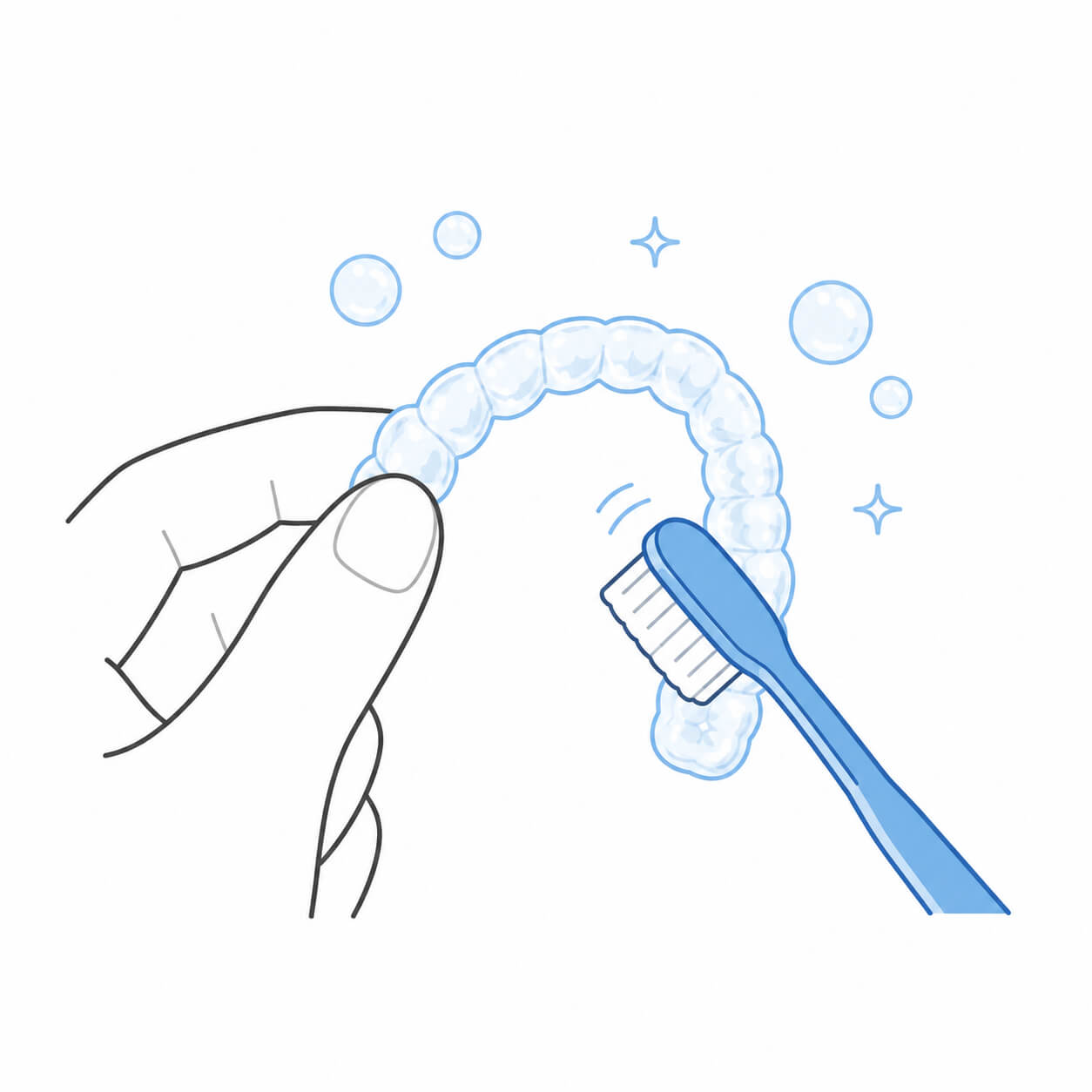 歯ブラシでアライナーを洗浄するイラスト